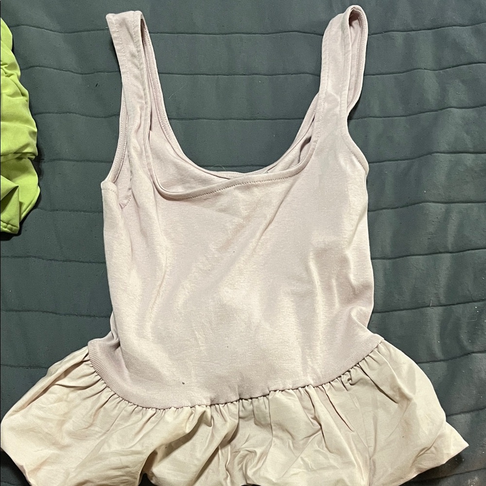 Light Pink Sleeveless Peplum Top
